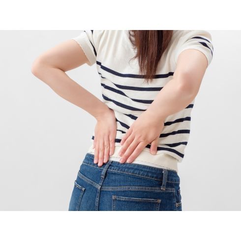 腰痛の女性